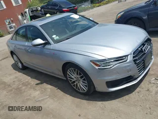 2016 Audi A6 Prestige with VIN WAUHGAFC1GN095006, listed as a IAAI auction lot 42607718 with 128,147 mi miles and . Bid and sale history available at DreamBid. Image 1.