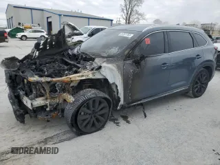 2021 Mazda CX-9 Grand Touring z VIN JM3TCADY9M0503873, wystawiony jako Copart lot #81351763 z przebiegiem Nie podano mil oraz Nie do naprawy • Non repairable. Historia ofert i sprzedaży dostępna na DreamBid. Obrazek 1.