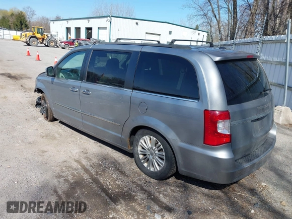 2013 Chrysler Town & Country Touring L with VIN 2C4RC1CG6DR660858, listed as a IAAI auction lot 41970976 with 140,299 mi miles and . Bid and sale history available at DreamBid. Image 3.