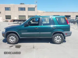 2000 Honda CR-V LX z VIN JHLRD2849YC011915, wystawiony jako IAAI lot #42040519 z przebiegiem 160 919 mil mil oraz . Historia ofert i sprzedaży dostępna na DreamBid. Obrazek 14.