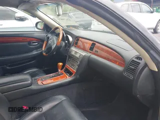 2004 Lexus SC with VIN JTHFN48Y940059470, listed as a IAAI auction lot 42139871 with 184,558 mi miles. Bid and sale history available at carsss.com. Image 5.