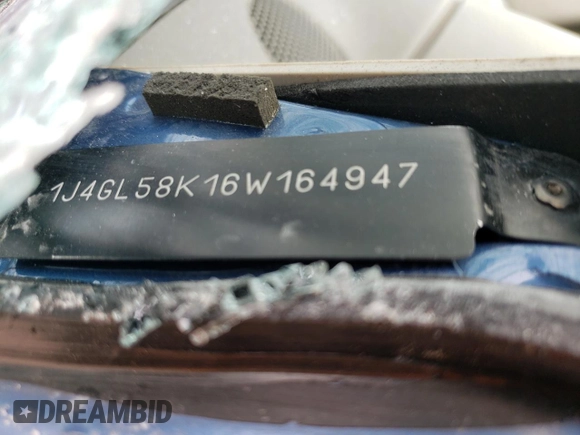 2006 Jeep Liberty Limited z VIN 1J4GL58K16W164947, wystawiony jako Copart lot #57055255 z przebiegiem Nie podano mil oraz Szkoda całkowita • Salvage title. Historia ofert i sprzedaży dostępna na DreamBid. Obrazek 13.