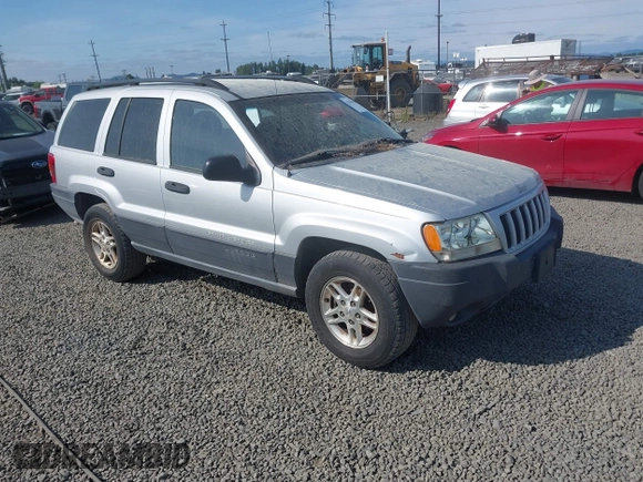 2004 Jeep Grand Cherokee Laredo z VIN 1J4GW48S34C272700, wystawiony jako IAAI lot #42494918 z przebiegiem 214 843 mil mil oraz . Historia ofert i sprzedaży dostępna na DreamBid. Obrazek 1.