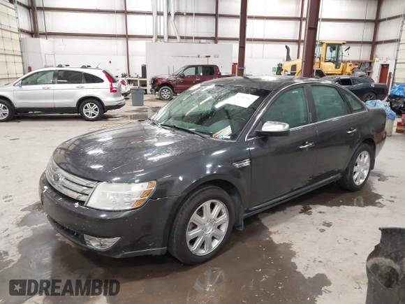 2008 Ford Taurus Limited with VIN 1FAHP28W08G141243, listed as a IAAI auction lot 41327967 with 157,482 mi miles. Bid and sale history available at carsss.com. Image 2.