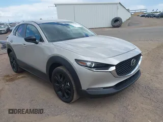 2024 Mazda CX-30 S Select Sport with VIN 3MVDMBBM3RM657918, listed as a IAAI auction lot 42218316 with 27,595 mi miles and . Bid and sale history available at carsss.com. Image 1.