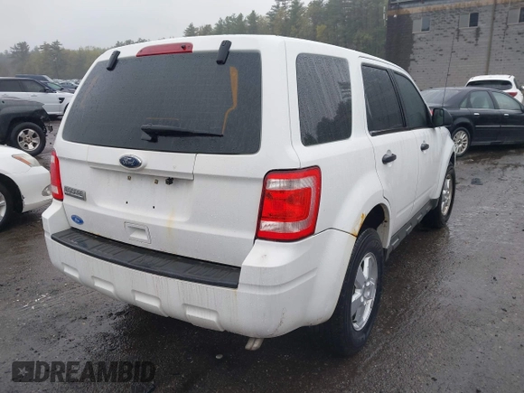2010 Ford Escape XLS with VIN 1FMCU9C70AKC41802, listed as a IAAI auction lot 42163243 with 106,189 mi miles and . Bid and sale history available at DreamBid. Image 4.