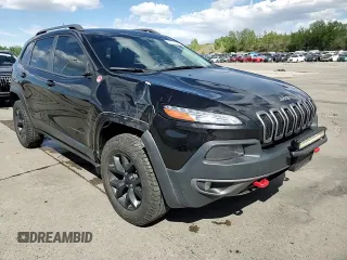 2014 Jeep Cherokee Trailhawk z VIN 1C4PJMBS1EW239692, wystawiony jako Copart lot #57153065 z przebiegiem 111 899 mil mil oraz Szkoda całkowita • Salvage title. Historia ofert i sprzedaży dostępna na DreamBid. Obrazek 14.