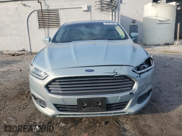 2013 Ford Fusion SE Hybrid z VIN 3FA6P0LU7DR368711, wystawiony jako Copart lot #62367685 z przebiegiem 155 284 mil mil oraz Czysty tytuł • Clean title. Historia ofert i sprzedaży dostępna na DreamBid. Obrazek 5.