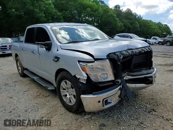 2017 Nissan Titan SV z VIN 1N6AA1E68HN500682, wystawiony jako Copart lot #57562415 z przebiegiem 185 539 mil mil oraz Szkoda całkowita • Salvage title. Historia ofert i sprzedaży dostępna na DreamBid. Obrazek 13.