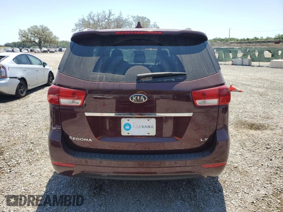 2018 Kia Sedona LX with VIN KNDMB5C10J6357318, listed as a Copart auction lot 54862705 with 64,474 mi miles and Salvage Title. Bid and sale history available at DreamBid. Image 6.