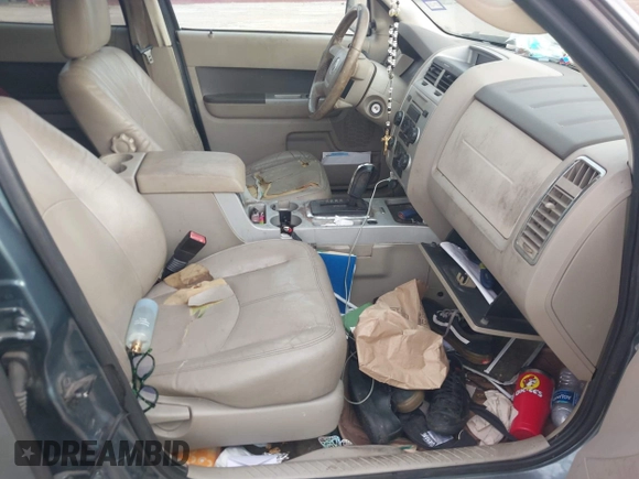 2010 Mercury Mariner with VIN 4M2CN8B76AKJ26340, listed as a IAAI auction lot 42260739 with 196,610 mi miles and . Bid and sale history available at DreamBid. Image 5.