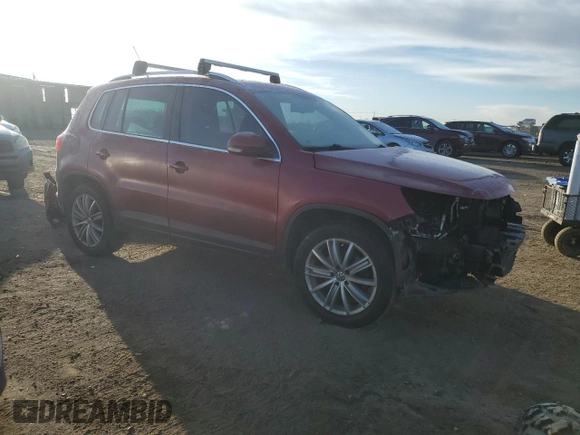 2011 Volkswagen Tiguan SEL with VIN WVGBV7AX4BW001386, listed as a Copart auction lot 44495945 with 149,806 mi miles and Salvage Title. Bid and sale history available at DreamBid. Image 4.