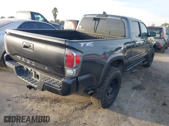 2021 Toyota Tacoma 4WD SR5 with VIN 3TMDZ5BN2MM108586, listed as a IAAI auction lot 41604953 with 65,422 mi miles. Bid and sale history available at carsss.com. Image 4.