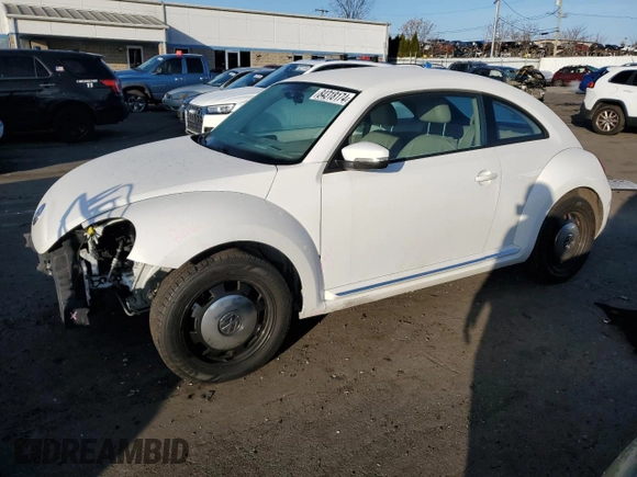 2014 Volkswagen Beetle 2.5L w/Sun with VIN 3VWJP7AT8EM610831, listed as a Copart auction lot 84318174 with 136,931 mi miles and Salvage Title. Bid and sale history available at DreamBid. Image 1.