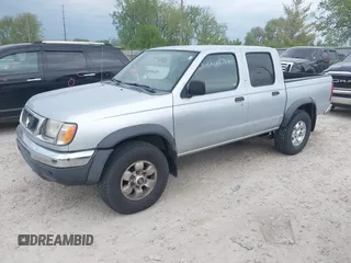 2000 Nissan Frontier XE with VIN 1N6ED27T1YC378034, listed as a IAAI auction lot 42145764 with 172,976 mi miles and . Bid and sale history available at DreamBid. Image 2.