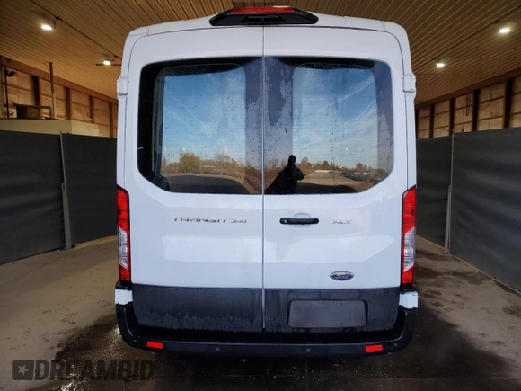 2023 Ford Transit Passenger XL with VIN 1FBAX2C81PKB30711, listed as a Copart auction lot 77797054 with 18,161 mi miles and Clean Title. Bid and sale history available at DreamBid. Image 6.