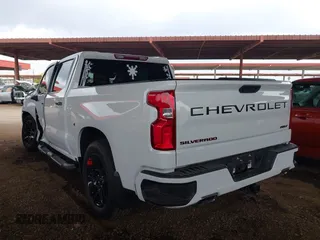 2023 Chevrolet Silverado 1500 with VIN 1GCPADE89PZ115977, listed as a IAAI auction lot 42025071 with 27,635 mi miles and . Bid and sale history available at DreamBid. Image 3.