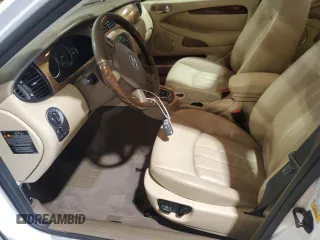2004 Jaguar X-Type with VIN SAJEA51C34WE06046, listed as a Copart auction lot 56982105 with 69,265 mi miles and Clean Title. Bid and sale history available at DreamBid. Image 7.