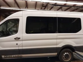 2019 Ford Transit Passenger XL with VIN 1FMZK1CM8KKA27343, listed as a IAAI auction lot 41607428 with 110,797 mi miles and . Bid and sale history available at DreamBid. Image 14.
