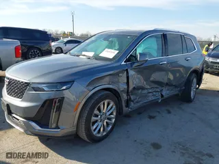 2020 Cadillac XT6 FWD Premium Luxury with VIN 1GYKPCRS8LZ129799, listed as a IAAI auction lot 41602536 with 96,865 mi miles. Bid and sale history available at carsss.com. Image 17.
