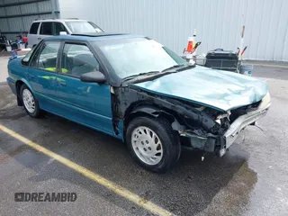 1995 Saturn SL z VIN 1G8ZK5271SZ147168, wystawiony jako IAAI lot #42480978 z przebiegiem 159 136 mil mil oraz . Historia ofert i sprzedaży dostępna na DreamBid. Obrazek 1.