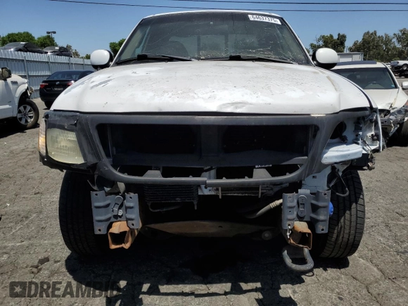 1999 Ford F-150 XL with VIN 1FTRX08LXXKA81637, listed as a Copart auction lot 64637375 with Not provided miles and Salvage title. Bid and sale history available at DreamBid. Image 5.