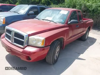 2006 Dodge Dakota SLT z VIN 1D7HE42N66S629432, wystawiony jako IAAI lot #42319636 z przebiegiem 187 086 mil mil oraz . Historia ofert i sprzedaży dostępna na DreamBid. Obrazek 2.