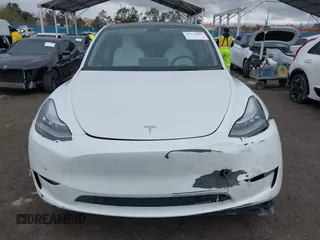 2023 Tesla Model Y Long Range with VIN 7SAYGDEE1PA106057, listed as a IAAI auction lot 41778642 with 1 mi miles. Bid and sale history available at carsss.com. Image 13.