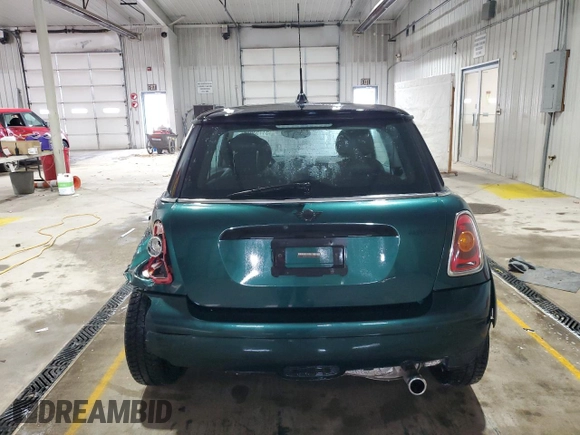 2008 MINI Hardtop with VIN WMWMF33558TT66729, listed as a Copart auction lot 51153645 with 127,357 mi miles and Salvage Title. Bid and sale history available at DreamBid. Image 6.