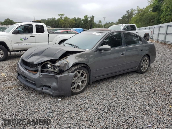 2005 Nissan Altima SE-R with VIN 1N4BL11D55C272885, listed as a Copart auction lot 71732094 with 207,633 mi miles and Salvage title. Bid and sale history available at DreamBid. Image 1.