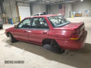 1995 Ford Escort z VIN 3FASP13J2SR157861, wystawiony jako Copart lot #82770964 z przebiegiem 48 610 mil mil oraz Szkoda całkowita • Salvage title. Historia ofert i sprzedaży dostępna na DreamBid. Obrazek 2.