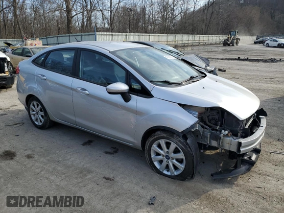 2012 Ford Fiesta SE with VIN 3FADP4BJ9CM121045, listed as a Copart auction lot 47297575 with 83,785 mi miles and Salvage Title. Bid and sale history available at DreamBid. Image 4.