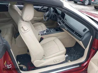 2019 Audi A5 Cabriolet Premium Plus with VIN WAUYNGF56KN002340, listed as a IAAI auction lot 41521638 with 69,381 mi miles. Bid and sale history available at carsss.com. Image 5.