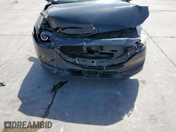 2021 Mazda CX-5 Touring with VIN JM3KFBCM3M0343447, listed as a Copart auction lot 49587305 with 99,633 mi miles and Salvage Title. Bid and sale history available at carsss.com. Image 14.