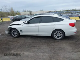 2014 BMW 3 Series GT 328i xDrive with VIN WBA3X5C5XED559713, listed as a IAAI auction lot 42078622 with 68,233 mi miles. Bid and sale history available at carsss.com. Image 14.