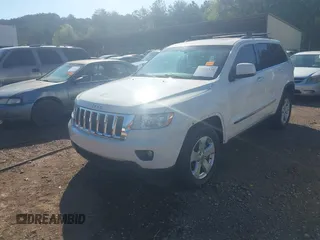 2012 Jeep Grand Cherokee Laredo with VIN 1C4RJEAG5CC106203, listed as a IAAI auction lot 41821138 with 157,474 mi miles. Bid and sale history available at carsss.com. Image 2.