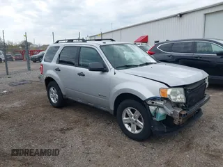 2009 Ford Escape Hybrid with VIN 1FMCU49389KA69814, listed as a IAAI auction lot 42100175 with 199,858 mi miles and . Bid and sale history available at DreamBid. Image 1.