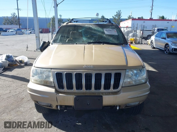 1999 Jeep Grand Cherokee Limited with VIN 1J4GW68NXXC727844, listed as a IAAI auction lot 41290773 with 222,838 mi miles. Bid and sale history available at carsss.com. Image 13.