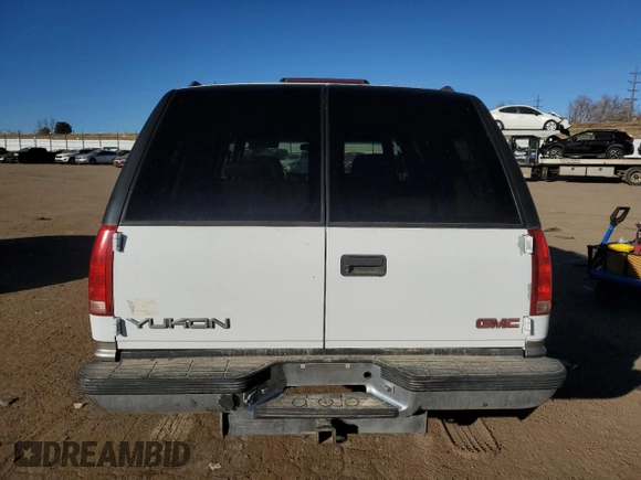 1999 GMC Denali z VIN 1GKEK13R5XR503159, wystawiony jako Copart lot #89018655 z przebiegiem 229 819 mil mil oraz Czysty tytuł • Clean title. Historia ofert i sprzedaży dostępna na DreamBid. Obrazek 6.
