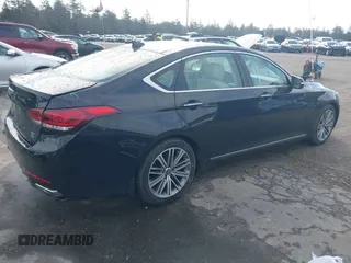 2018 Genesis G80 3.8L with VIN KMHGN4JE0JU246022, listed as a IAAI auction lot 41855219 with 106,277 mi miles. Bid and sale history available at carsss.com. Image 4.