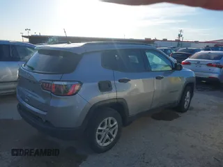 2018 Jeep Compass Sport with VIN 3C4NJCAB0JT124875, listed as a IAAI auction lot 41809953 with 136,018 mi miles. Bid and sale history available at carsss.com. Image 4.