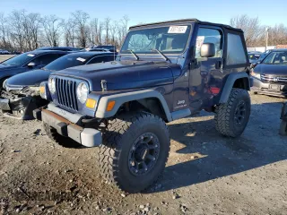 2005 Jeep Wrangler SE with VIN 1J4FA29S95P370542, listed as a Copart auction lot 85571924 with 105,465 mi miles and Salvage Title. Bid and sale history available at carsss.com. Image 1.