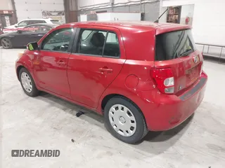 2008 Scion xD with VIN JTKKU10418J031679, listed as a IAAI auction lot 42087002 with 200,802 mi miles. Bid and sale history available at carsss.com. Image 3.