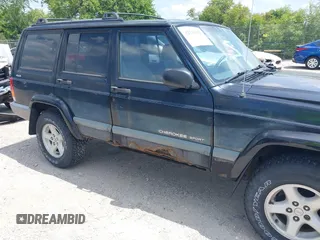 2000 Jeep Cherokee z VIN 1J4FF48S7YL273642, wystawiony jako IAAI lot #42743391 z przebiegiem 200 780 mil mil oraz . Historia ofert i sprzedaży dostępna na DreamBid. Obrazek 6.