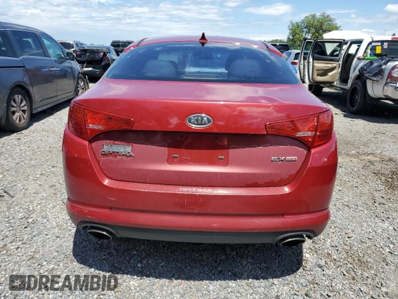 2011 Kia Optima EX z VIN KNAGN4A74B5119658, wystawiony jako Copart lot #56849105 z przebiegiem 117 269 mil mil oraz Szkoda całkowita • Salvage title. Historia ofert i sprzedaży dostępna na DreamBid. Obrazek 6.