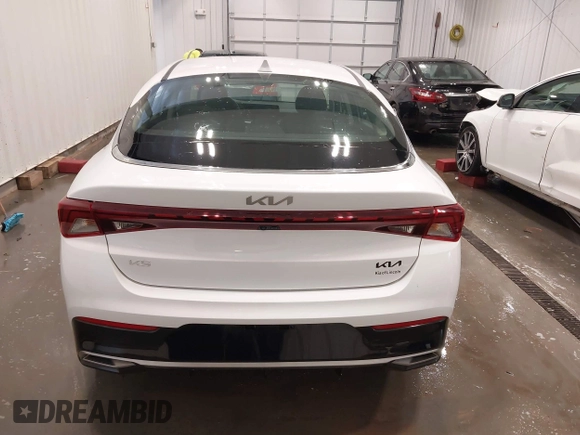 2023 Kia K5 LXS z VIN 5XXG14J2XPG189462, wystawiony jako IAAI lot #42233595 z przebiegiem 17 286 mil mil oraz . Historia ofert i sprzedaży dostępna na DreamBid. Obrazek 16.