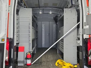 2023 Ford Transit Cargo with VIN 1FTBR1X87PKC01635, listed as a IAAI auction lot 42832727 with 17,348 mi miles and . Bid and sale history available at DreamBid. Image 21.
