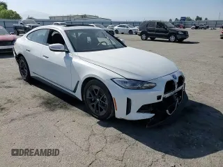 2022 BMW i4 eDrive40 with VIN WBY73AW09NFM42460, listed as a Copart auction lot 59141474 with 0 mi miles and Salvage Title. Bid and sale history available at carsss.com. Image 11.