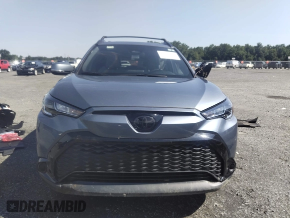 2024 Toyota Corolla Cross Hybrid S with VIN 7MUFBABG4RV059072, listed as a IAAI auction lot 42787833 with 9,006 mi miles and . Bid and sale history available at DreamBid. Image 12.