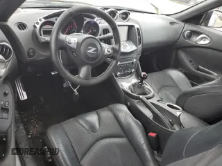 2009 Nissan 370Z Touring with VIN JN1AZ44E29M406023, listed as a Copart auction lot 73721324 with 108,072 mi miles and Salvage Title. Bid and sale history available at carsss.com. Image 8.